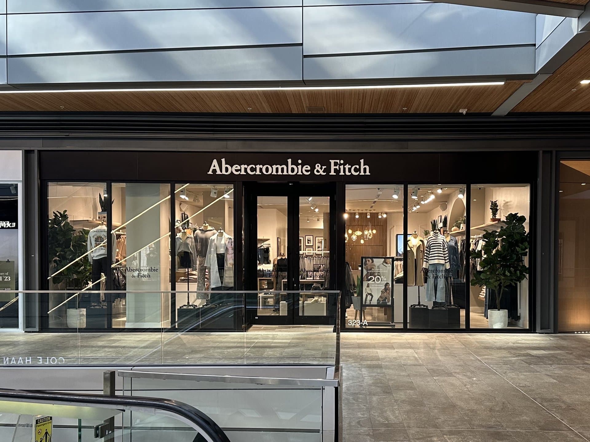 an entrance to a clothing showroom