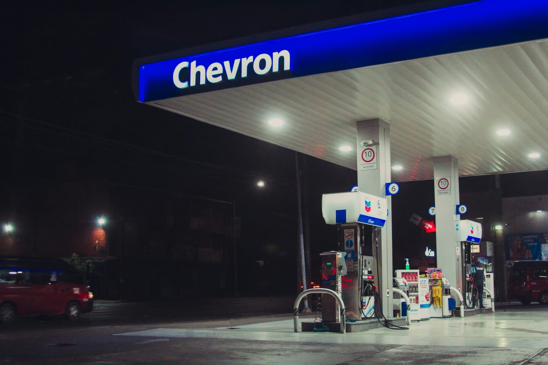 a gas station with blue branding