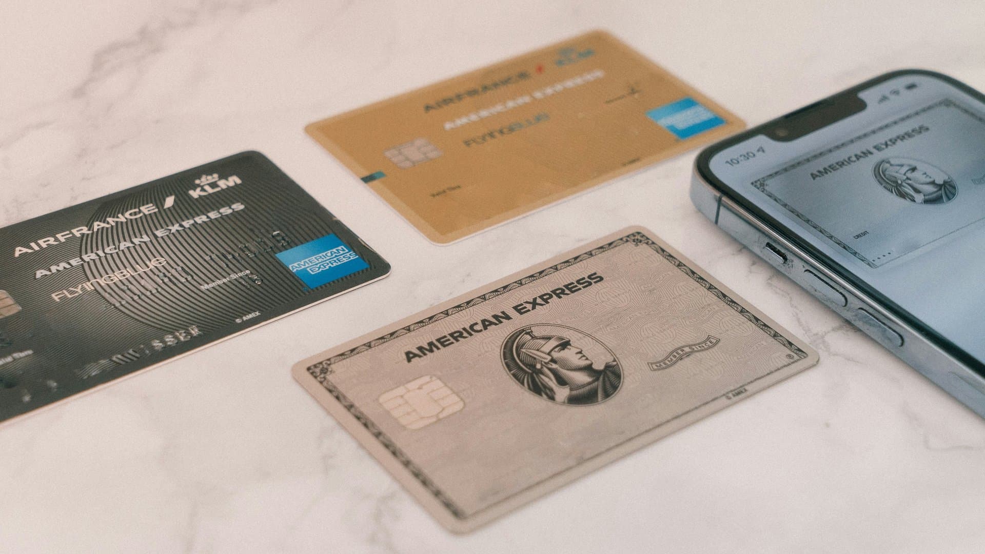 a range of amex cards on a table