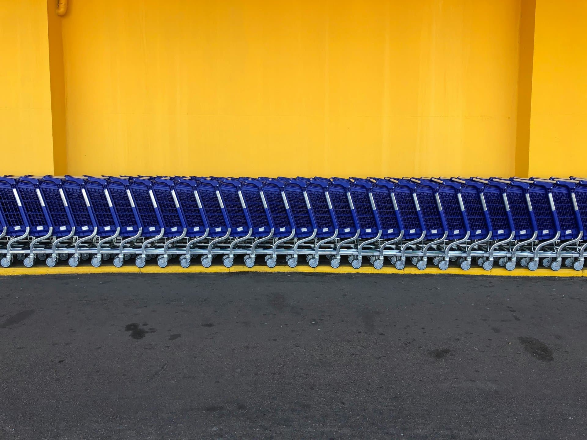 A series of shopping cart parked together