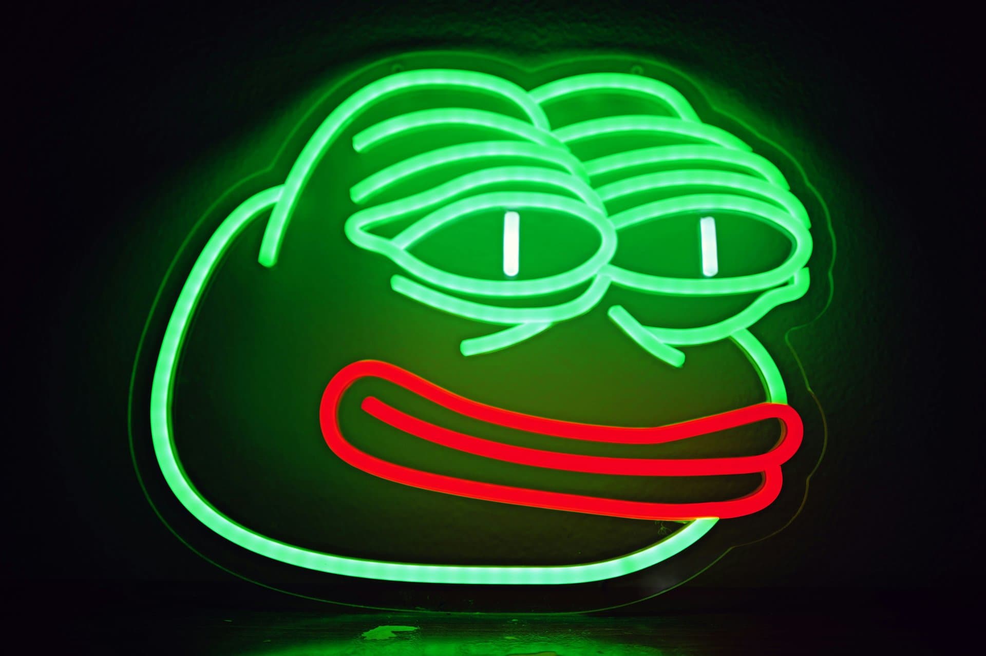 neon sign of pepe meme