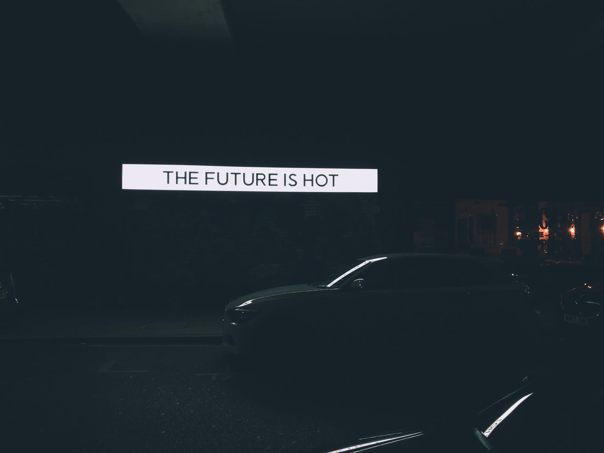 a sign board saying future is hot