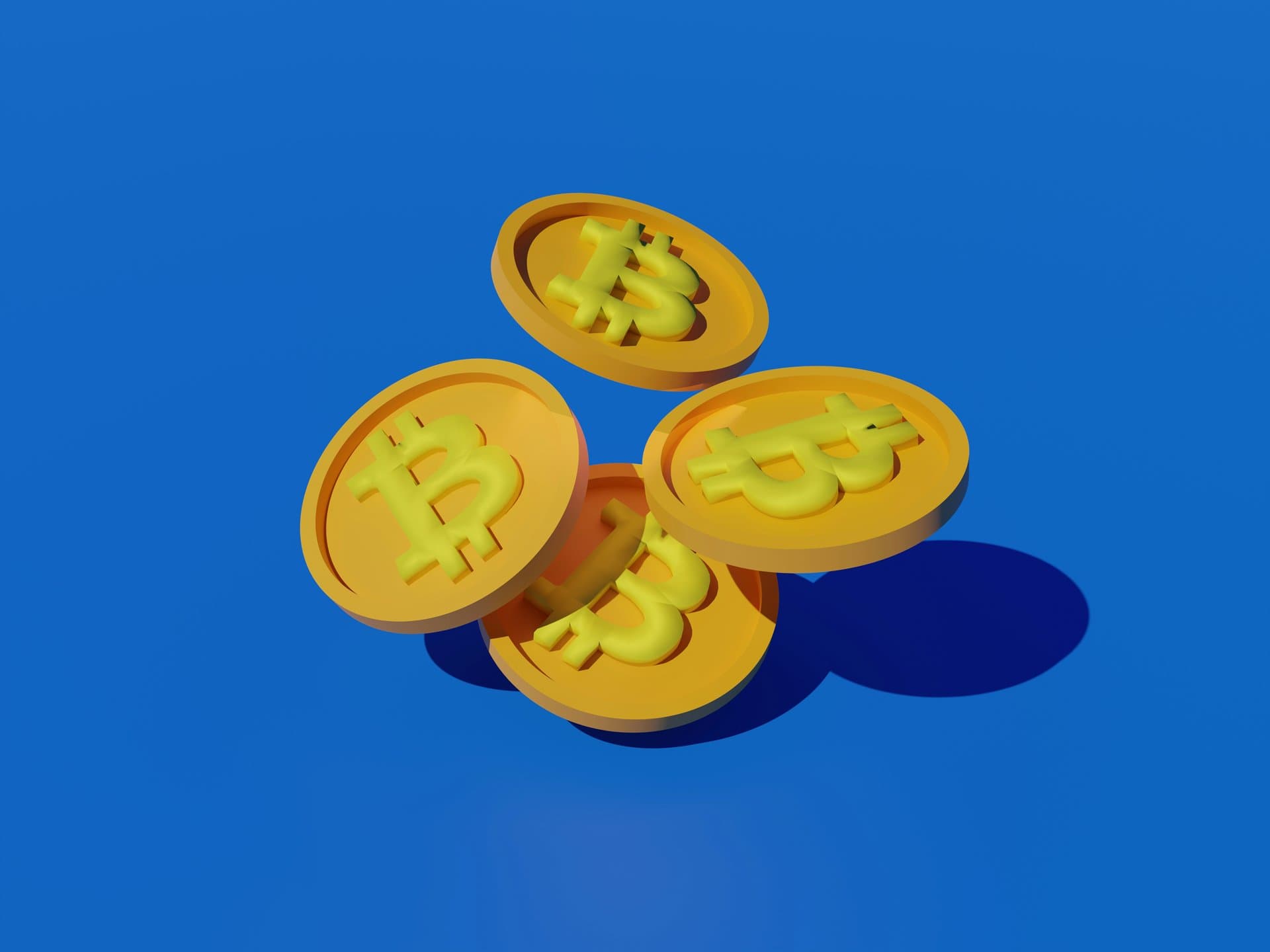 some plastic coins on a blue background