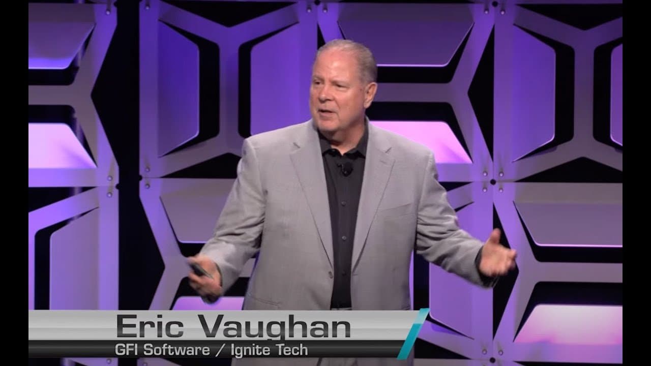 Eric Vaughan speaking on stage