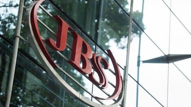 JBS logo on a glass building