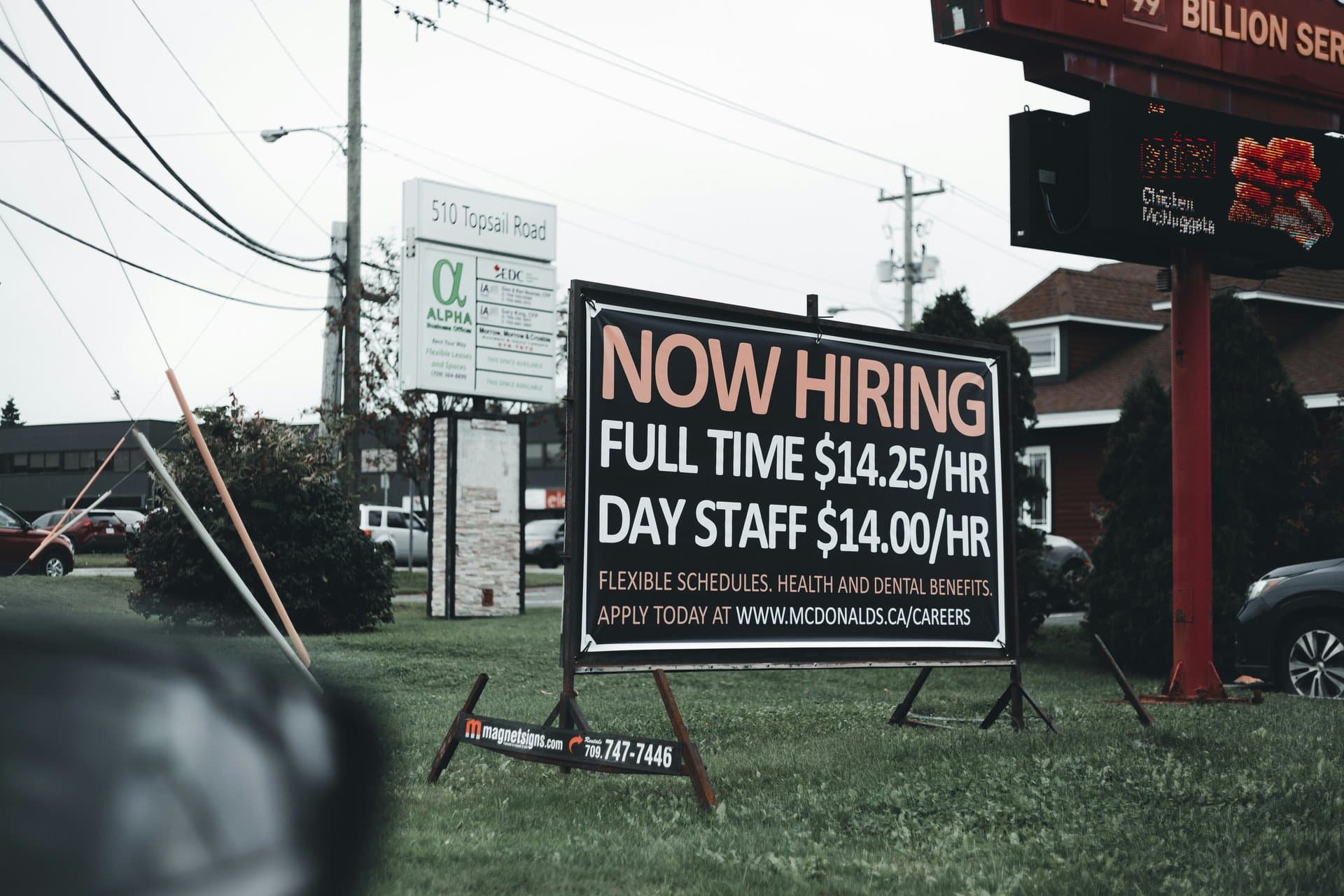 Now hiring board with prices
