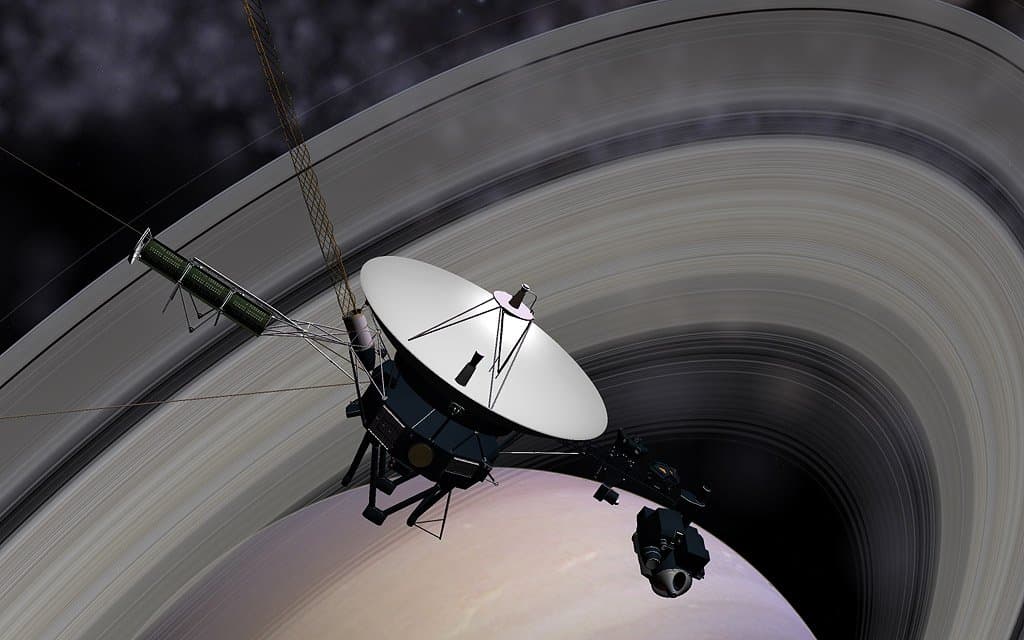 a satellite revolving saturn