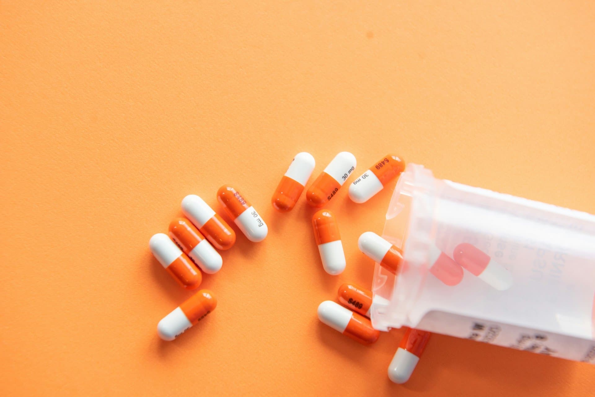 orange white capsules