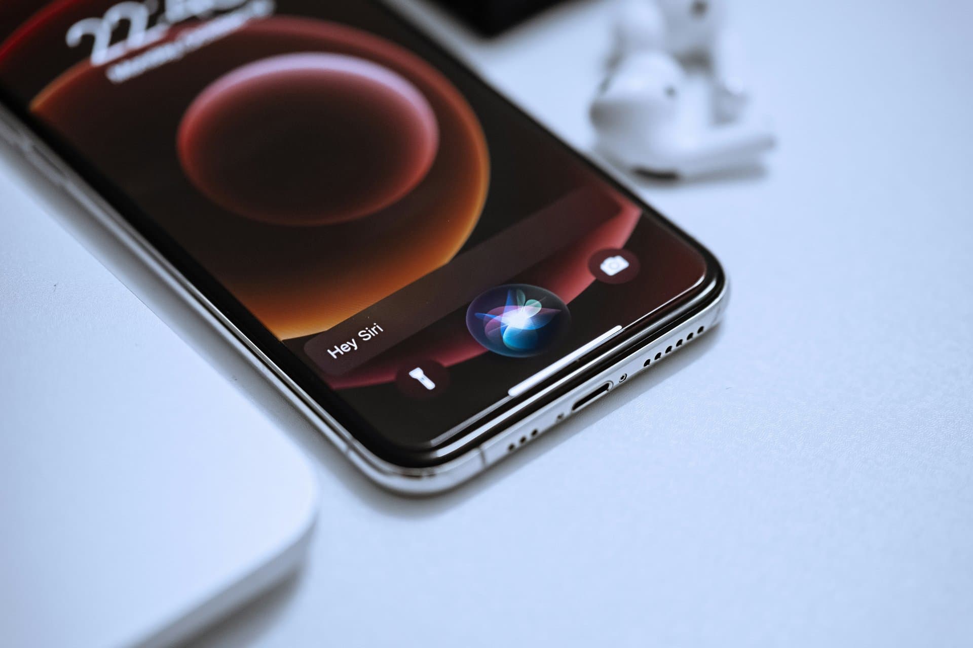 a phone with a siri screen prompt