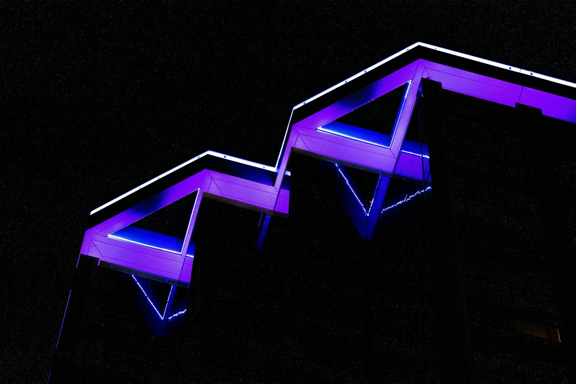 purple neon lights on a building
