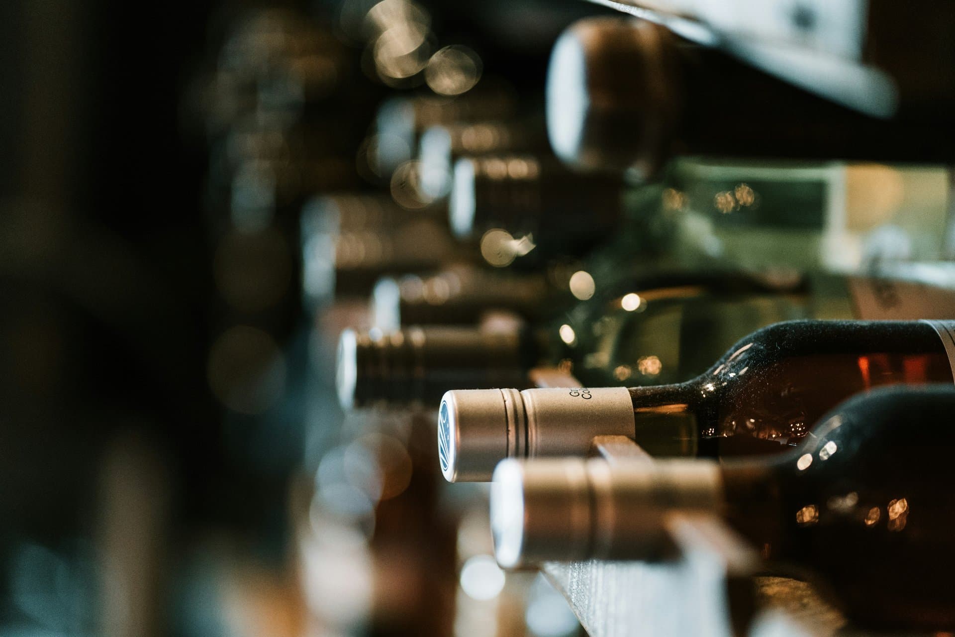 bottles of wines peeping from the shelves