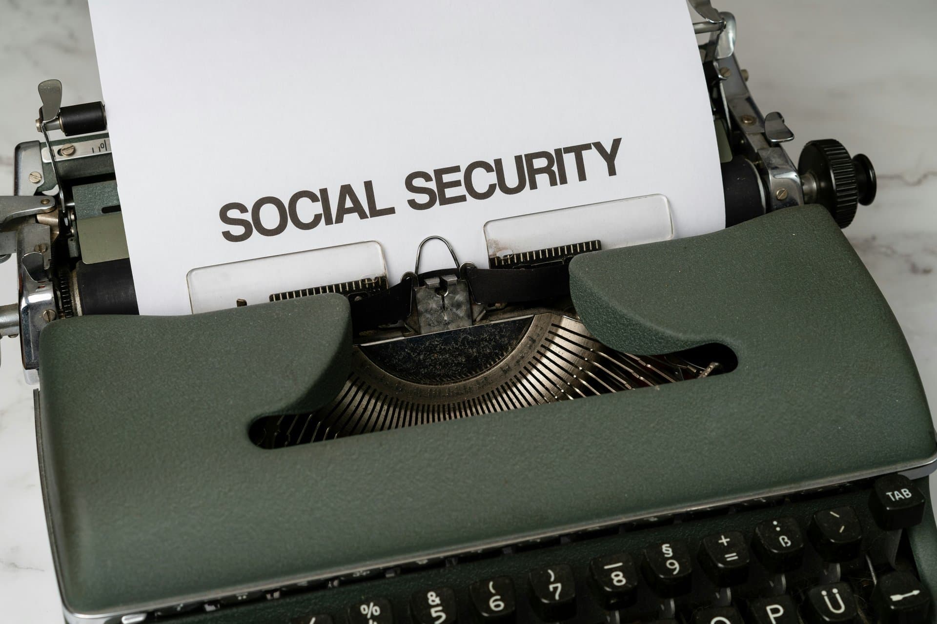 Social Security typed on a paper inside a typewriter