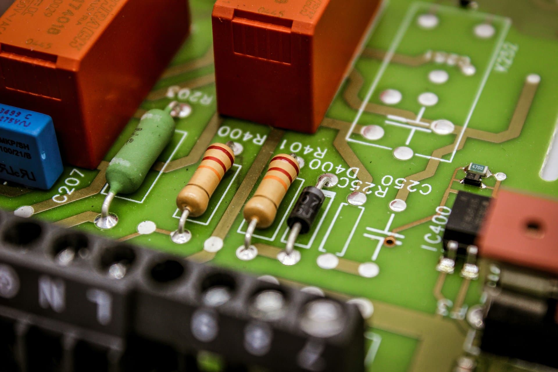 a motherboard with colorful chips and elements