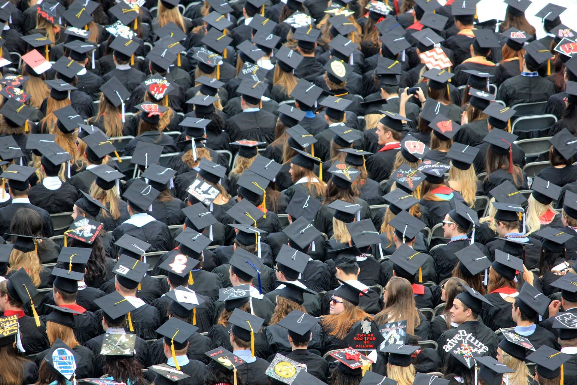 top shot of multiple graduating students in their hats