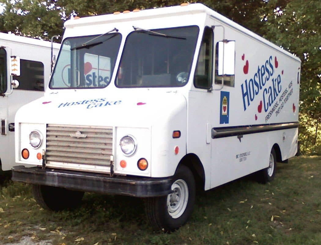 a white van serving cakes