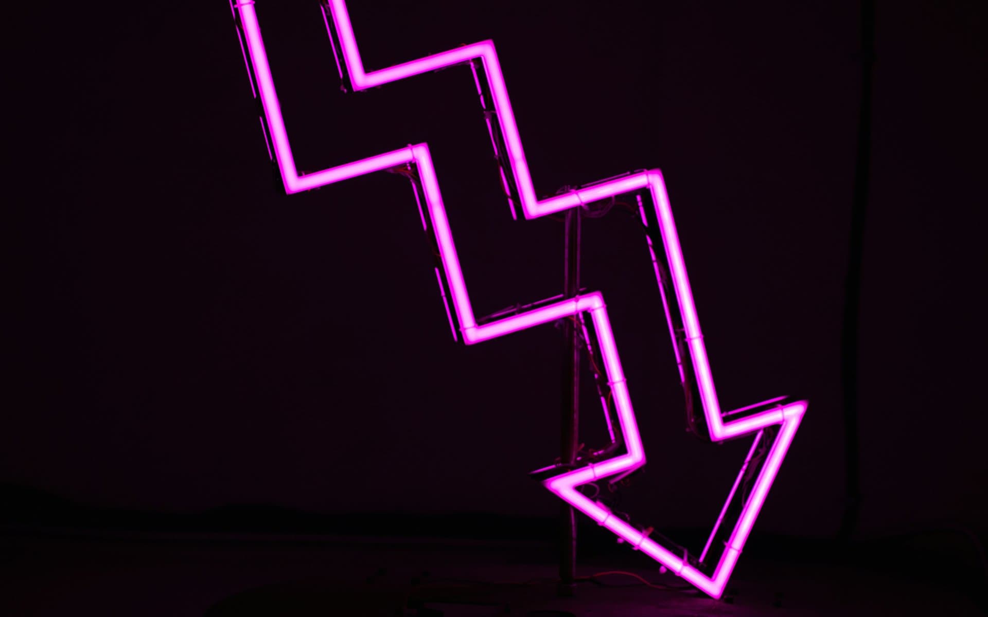 neon pink arrow pointing down