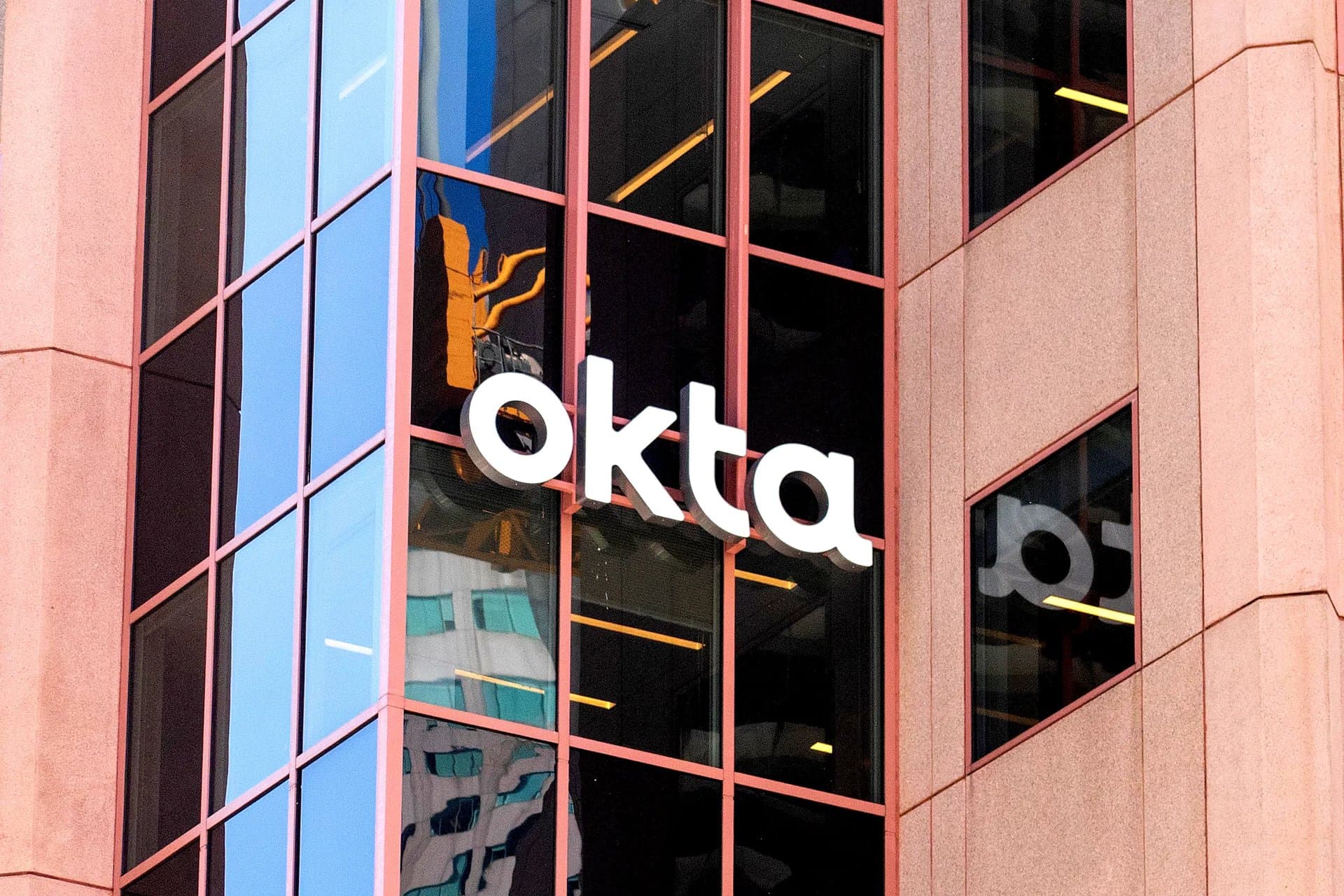 okta logo on a building