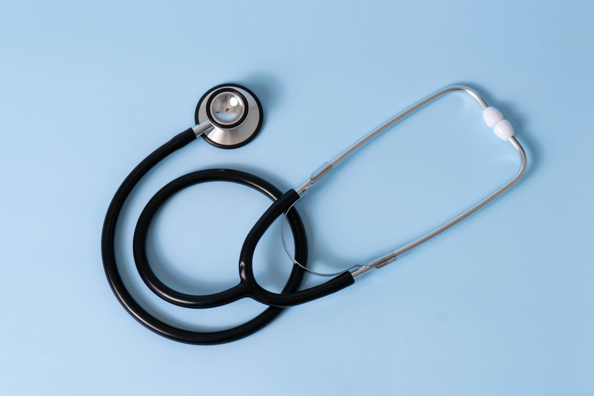 a stethoscope on a blue background