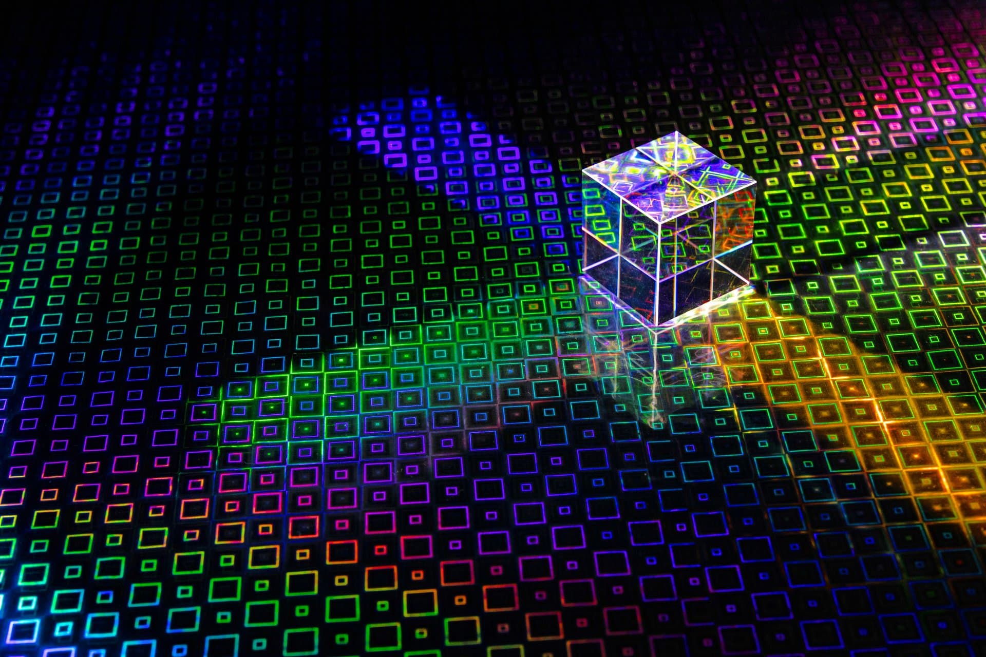 a cube casting colorful reflections