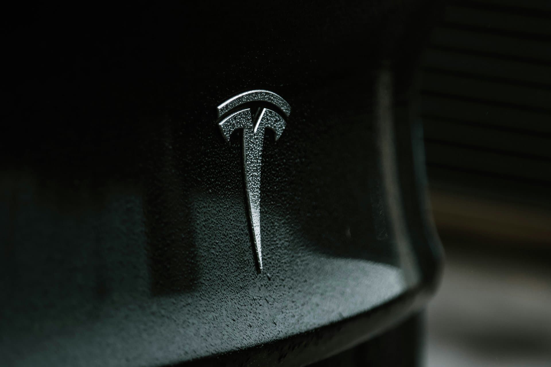 tesla logo on a car