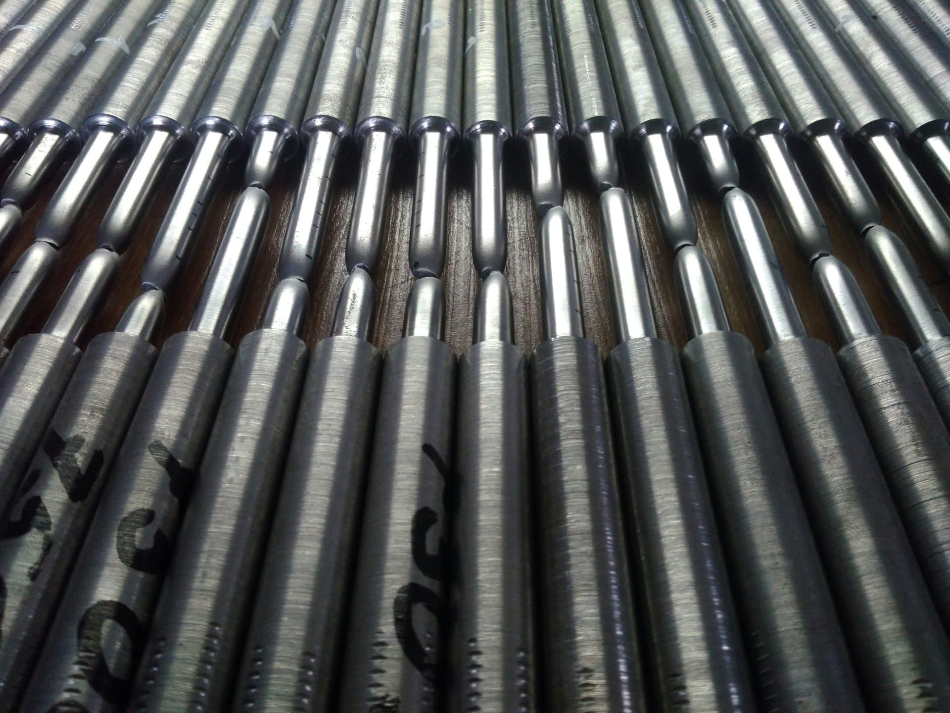 steel cylinders lined up near each other