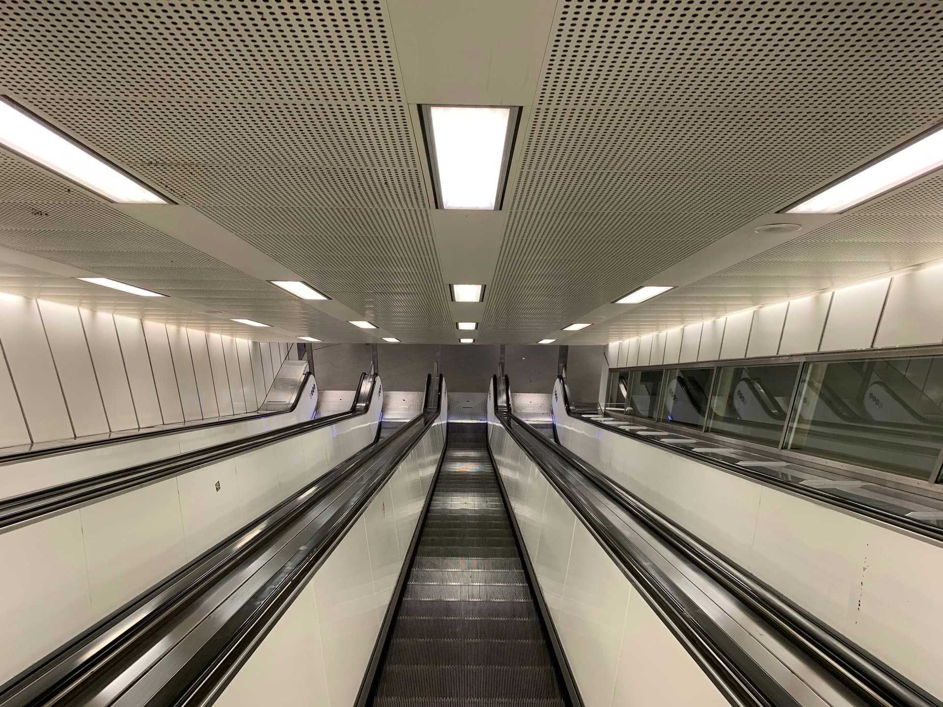 escalators in a subway station