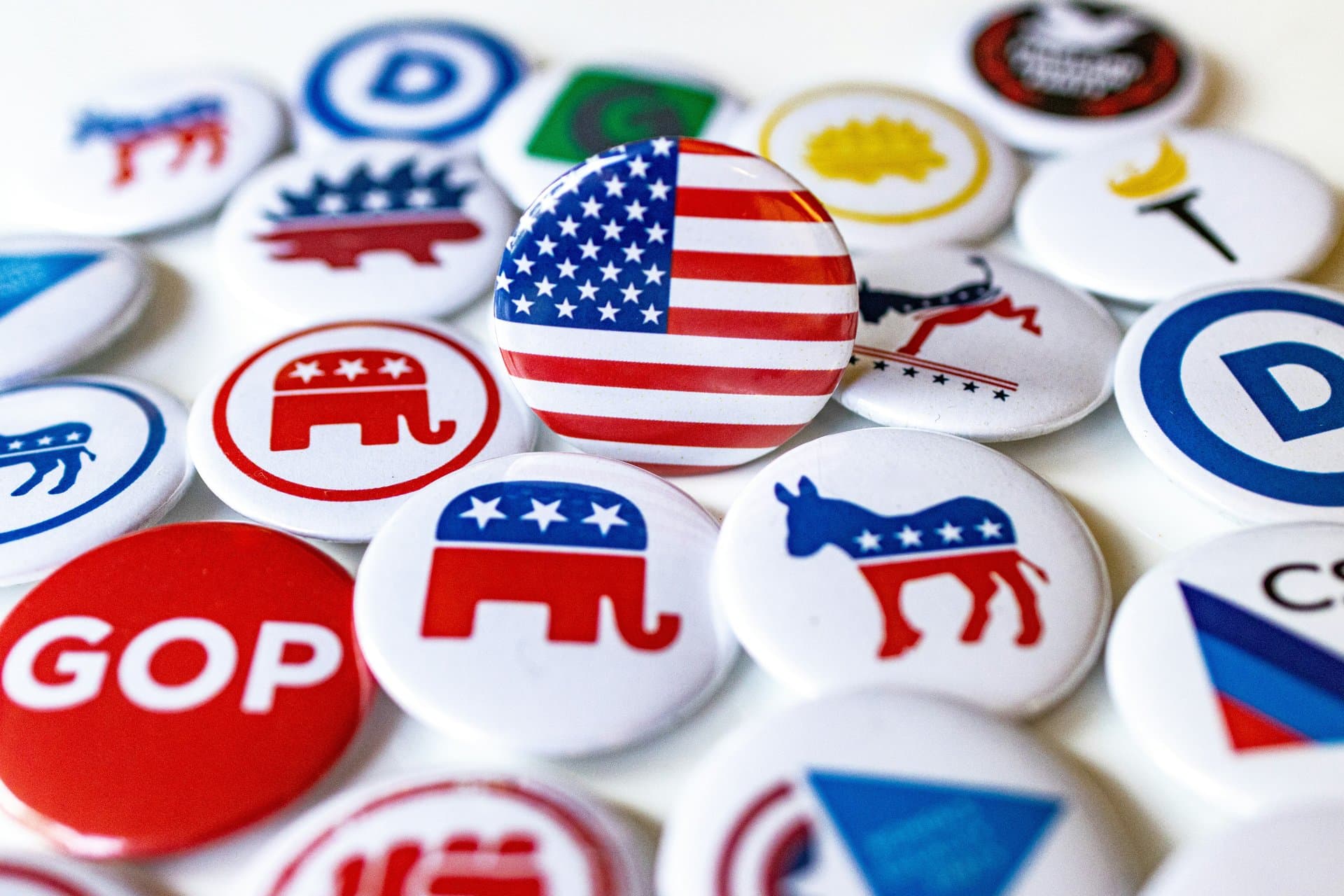 colorful pin badges with American flags