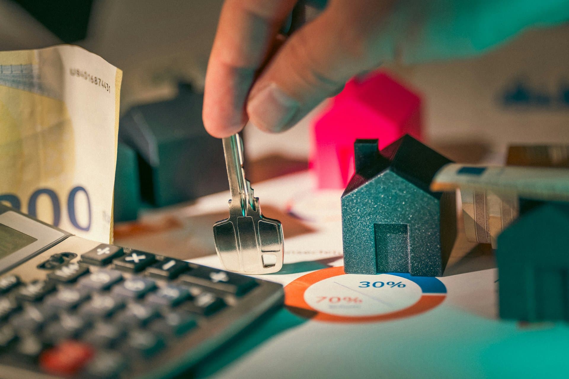 a toy house next to a key