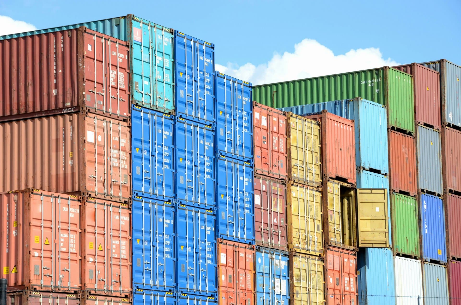 a pile of cargo containers