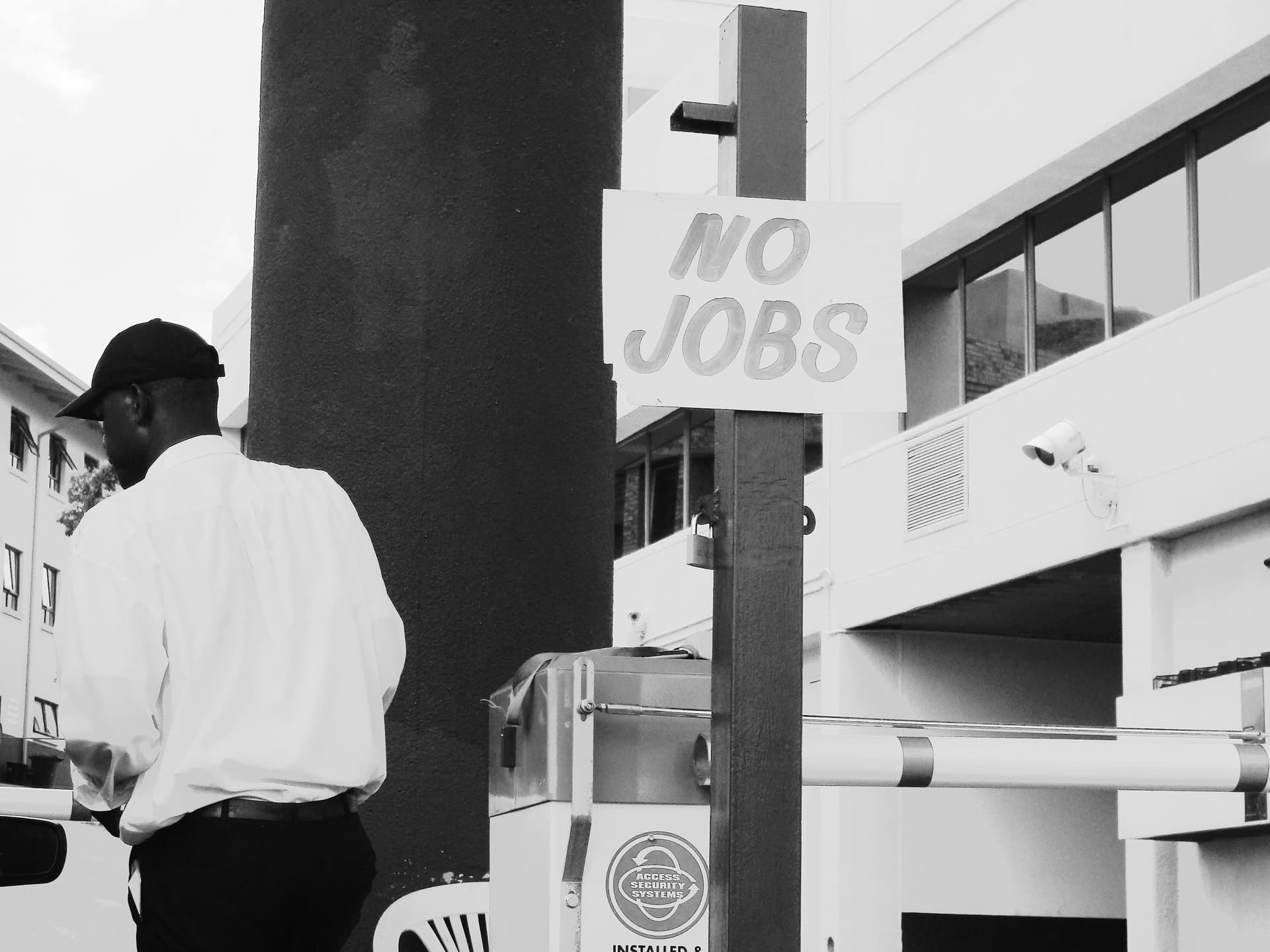 a board saying 'no jobs'