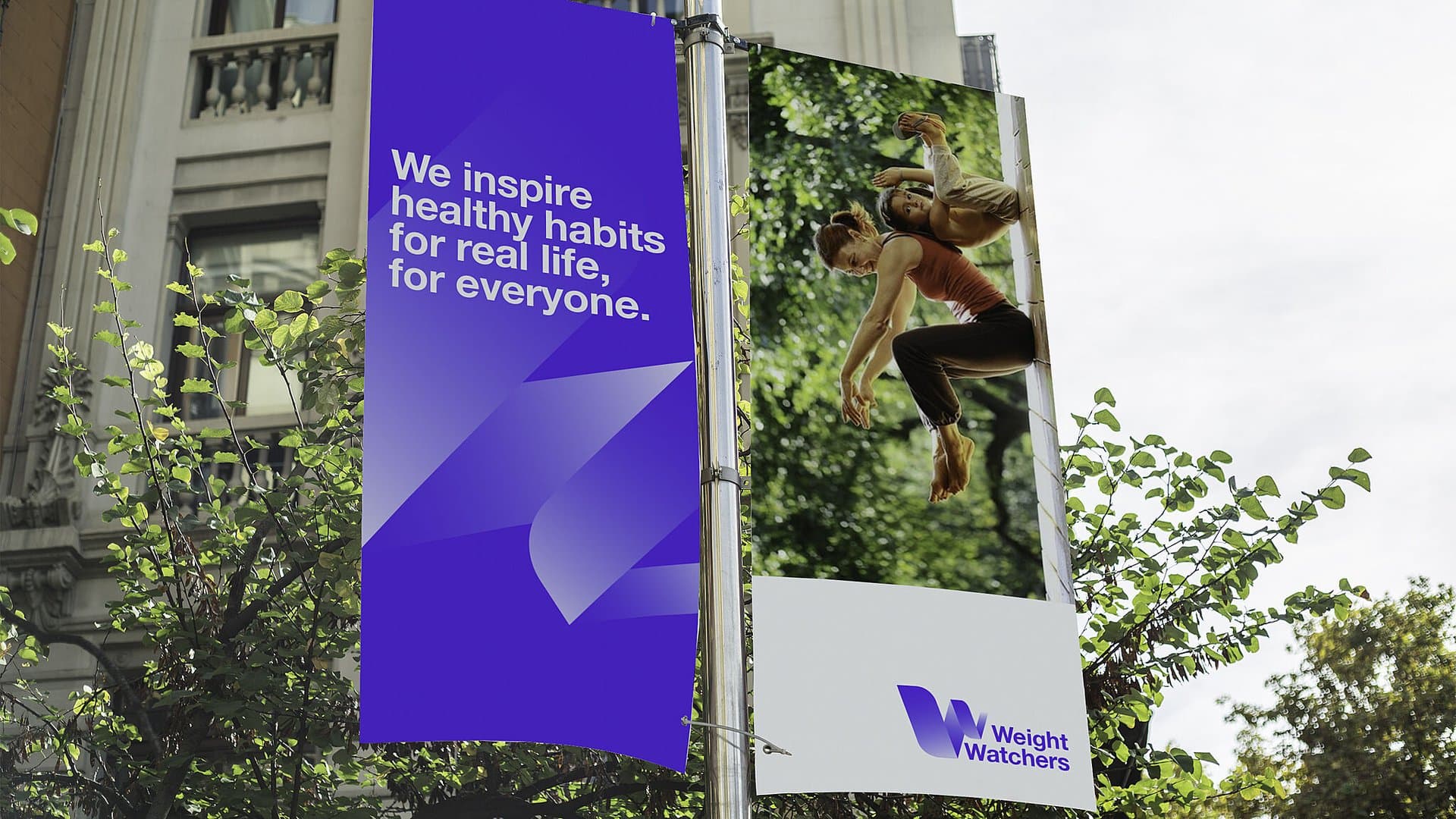 An advertising pole with bright blue ad banners.