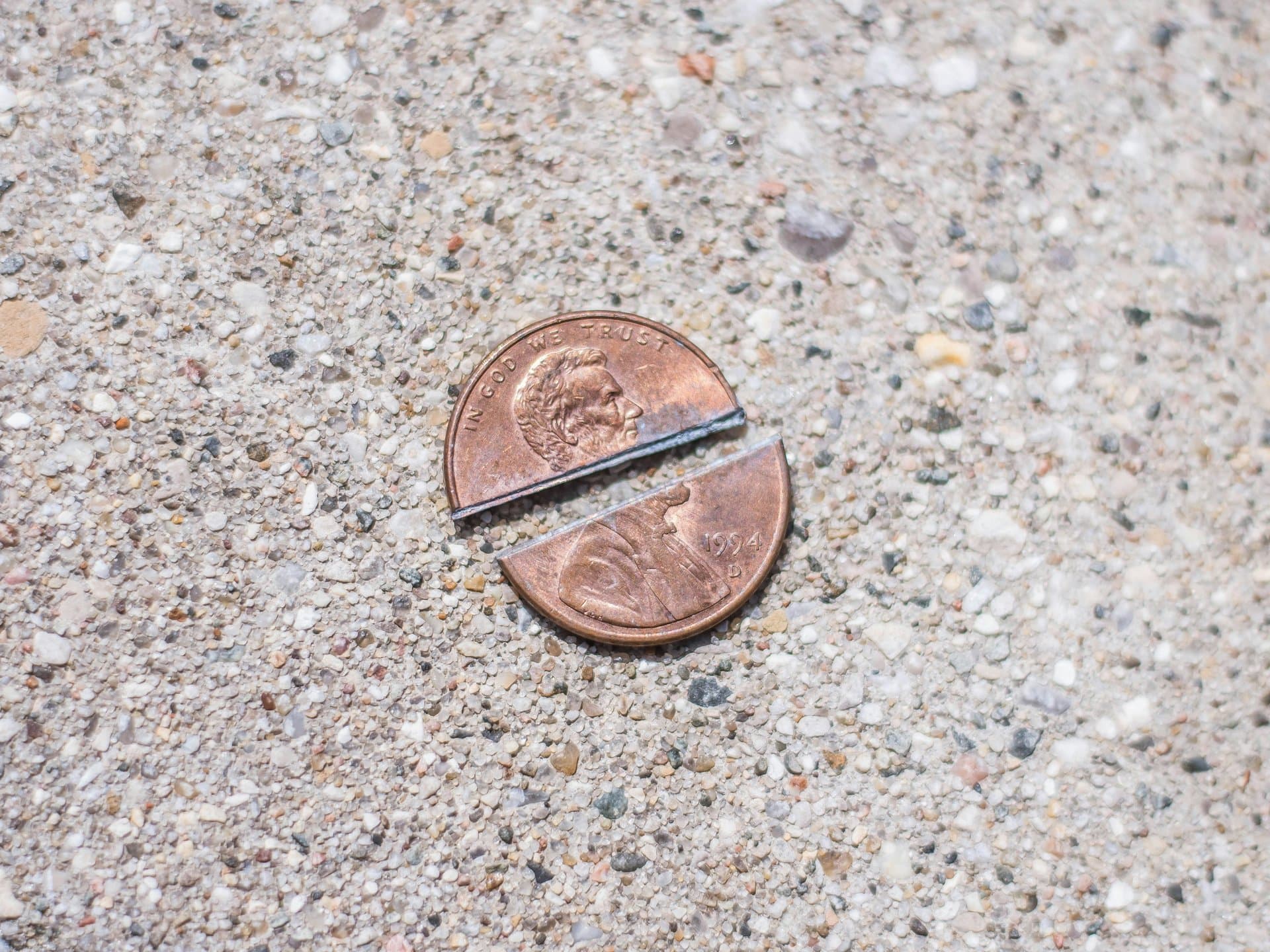 a penny broken into two pieces