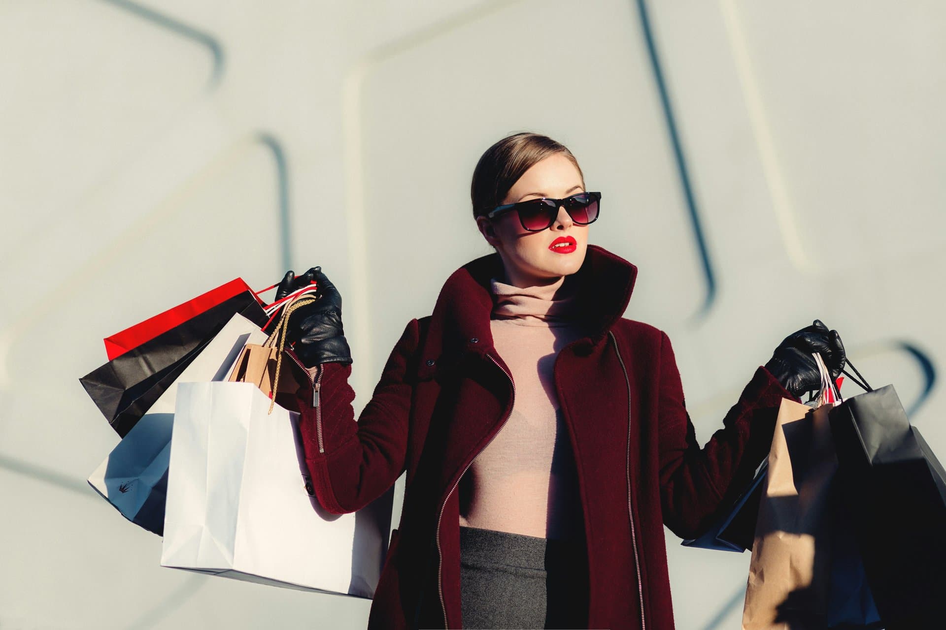 a lady with lots of shopping bags